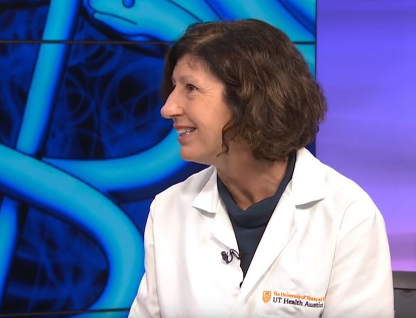 UT Health Austin Physician Assistant Teresa Reed speaks with a reporter in this screengrab from KXAN-TV.